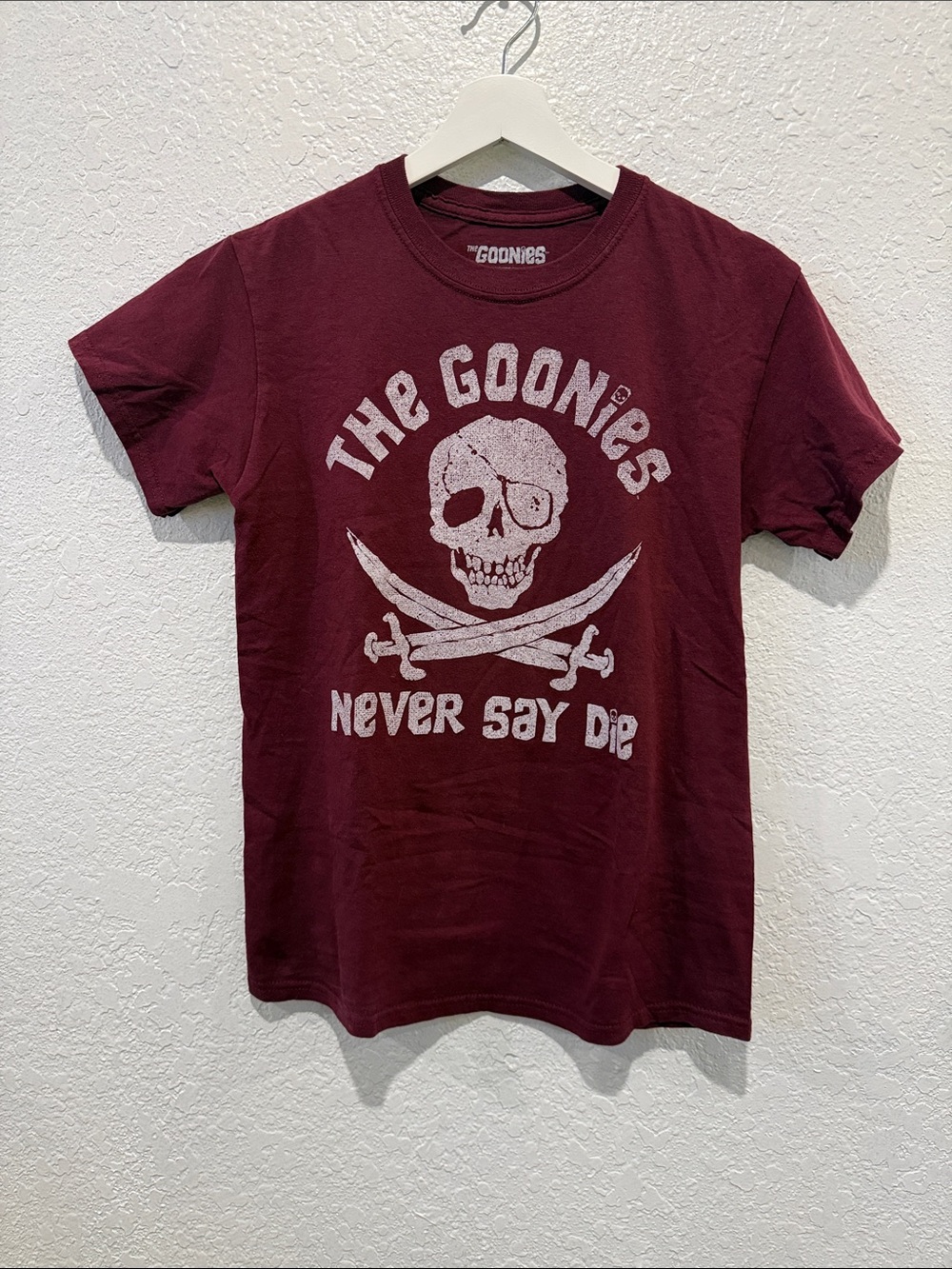 The Goonies 'Never Say Die' Skull Tee - Maroon, Women’s S